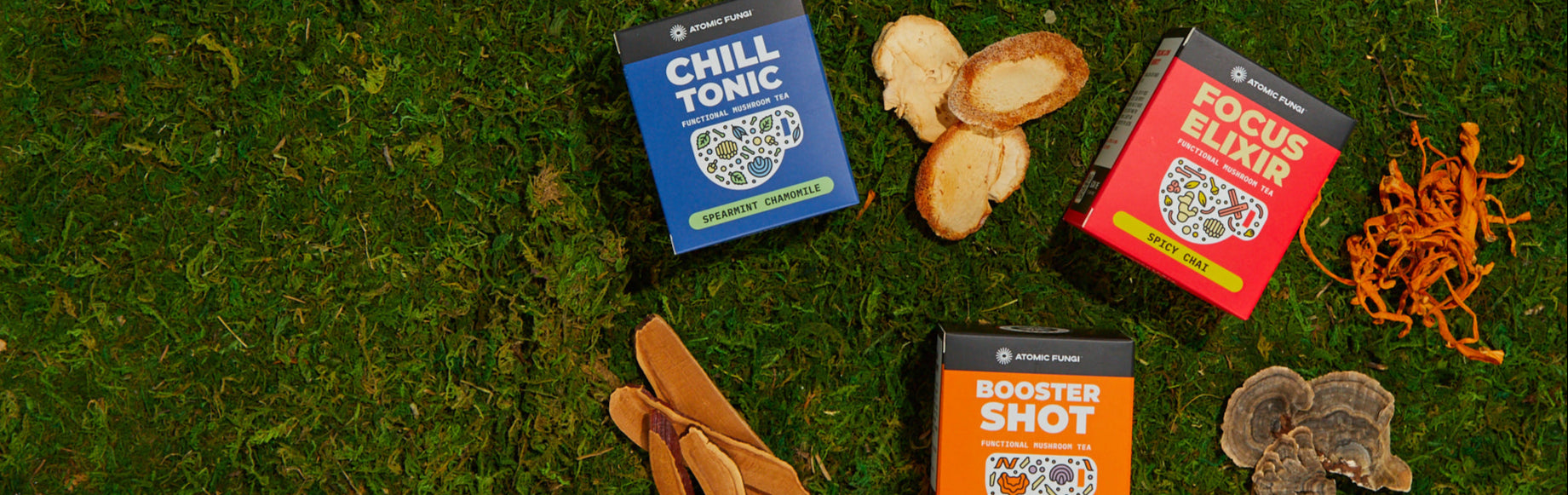 Three small boxes labeled 'Chill Tonic', 'Focus Elixir', and 'Booster Shot' on grass.